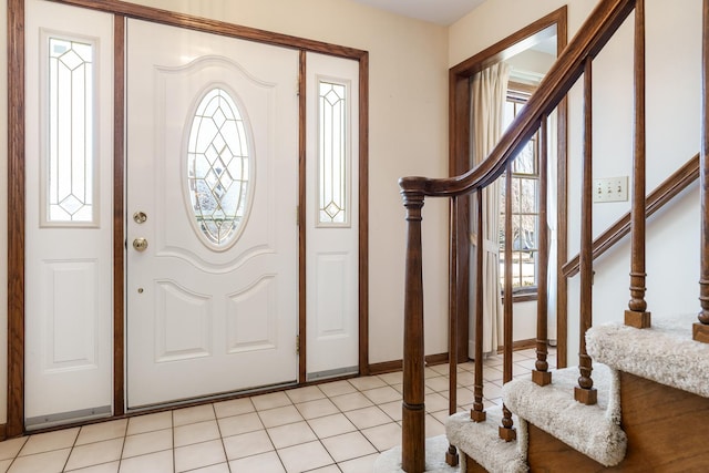 foyer featuring light tile patterned floors