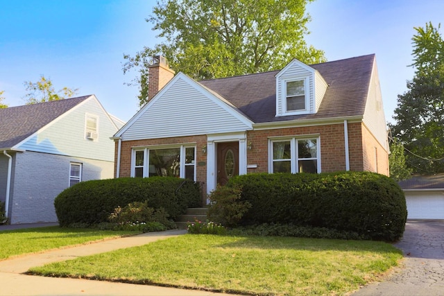 new england style home with a front yard