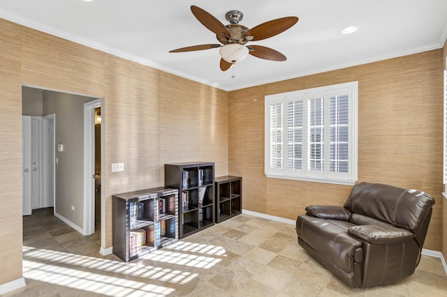 sitting room featuring ornamental molding