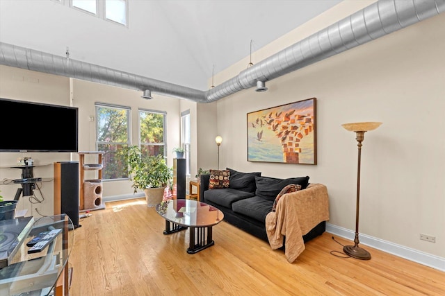 living room with hardwood / wood-style flooring