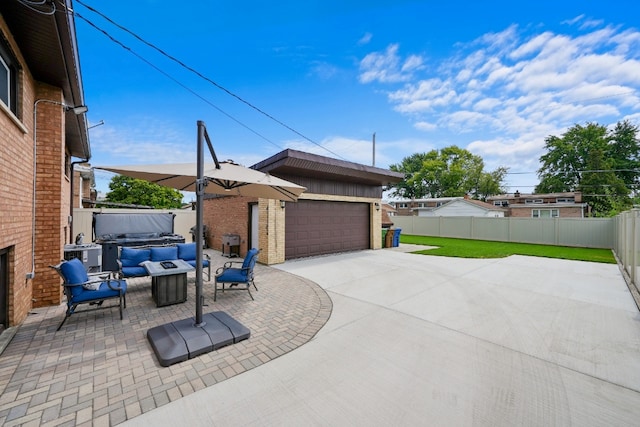 view of patio with a garage, outdoor lounge area, and cooling unit