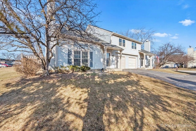 view of front property with a garage