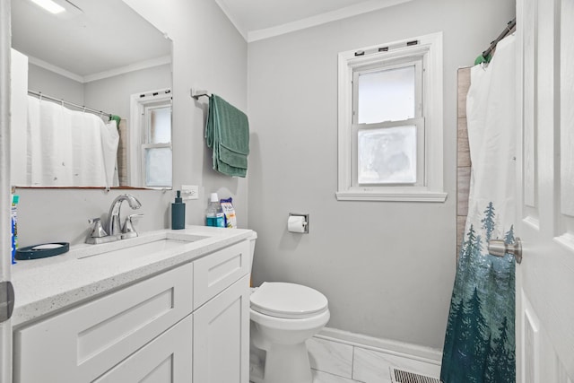 bathroom with vanity, a wealth of natural light, crown molding, and toilet