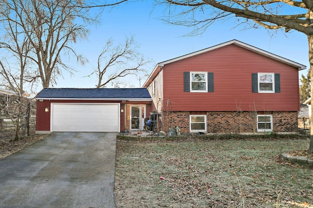 split level home featuring a garage