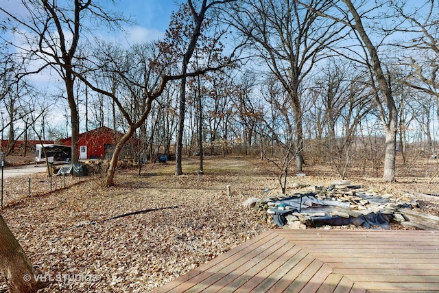 view of yard featuring a wooden deck