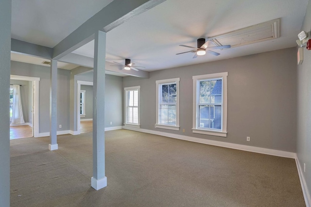 unfurnished room featuring ceiling fan and light colored carpet