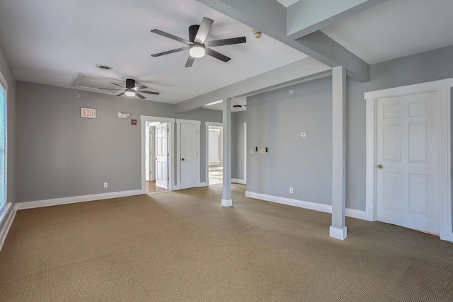 unfurnished living room featuring beamed ceiling, ceiling fan, and carpet