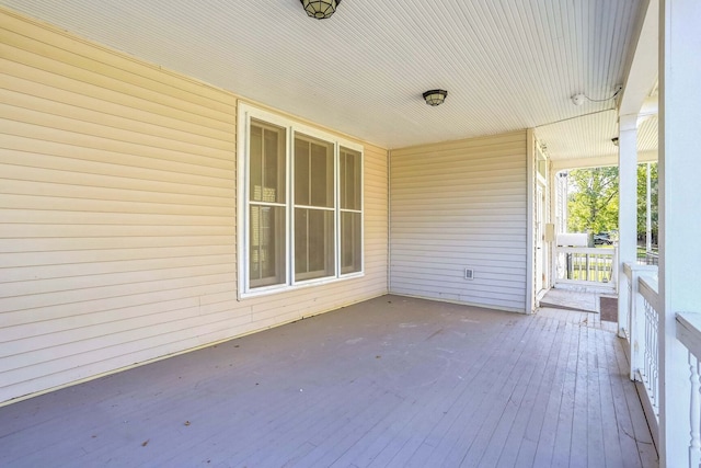 wooden deck featuring a porch