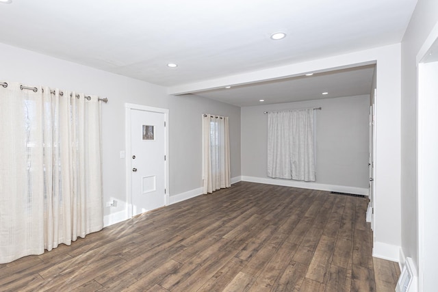 interior space with dark wood-type flooring