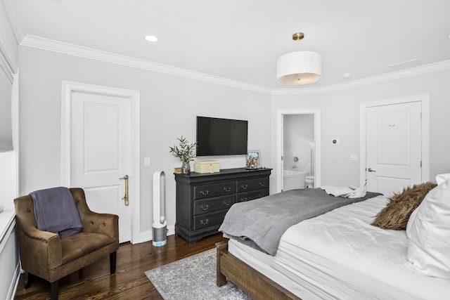 bedroom with baseboards, dark wood finished floors, ensuite bath, crown molding, and recessed lighting