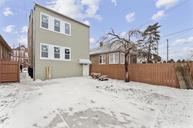 view of snow covered property