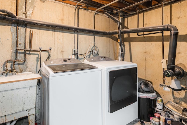 laundry area with washing machine and dryer