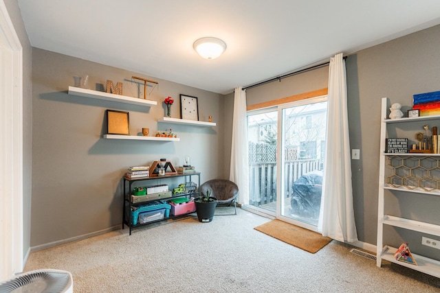 game room featuring light colored carpet