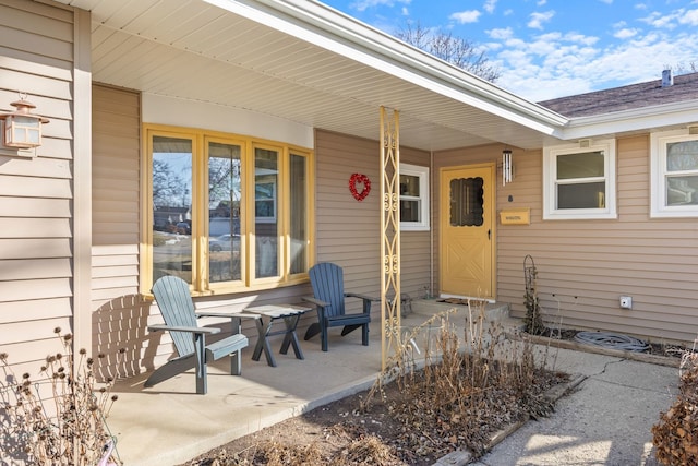 property entrance featuring covered porch