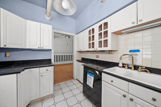 kitchen with white cabinetry, dishwasher, sink, and backsplash