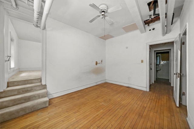 spare room with ceiling fan and light hardwood / wood-style flooring