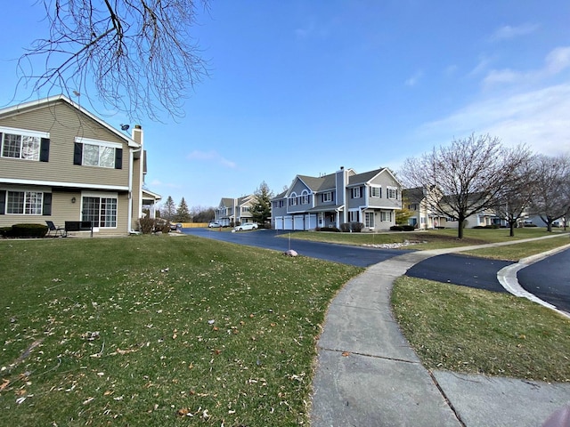 view of community featuring a lawn