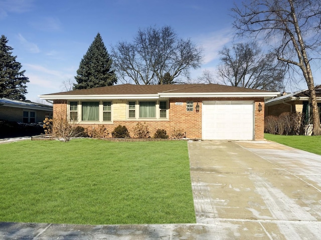 ranch-style home featuring a garage and a front lawn