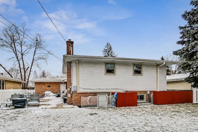 view of snow covered property