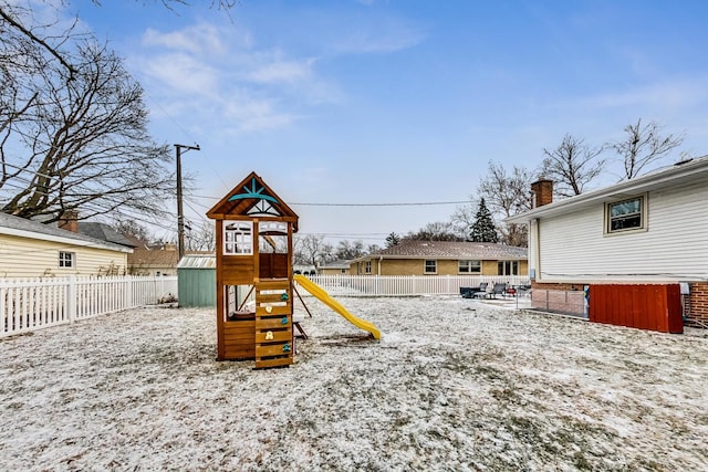 view of snow covered playground