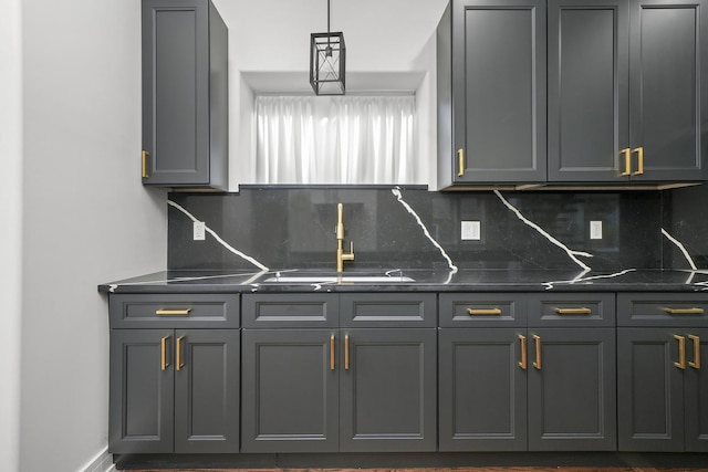 interior space featuring tasteful backsplash and sink