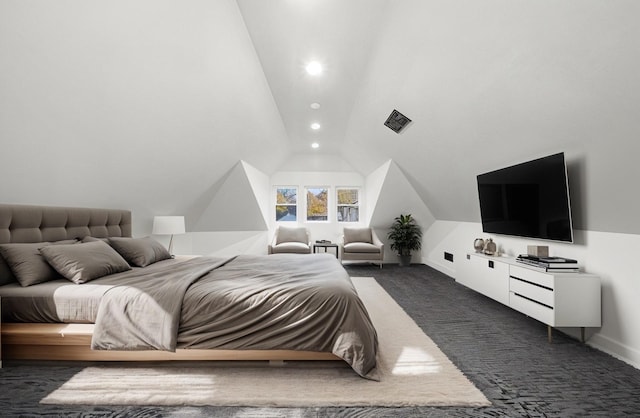 carpeted bedroom featuring vaulted ceiling