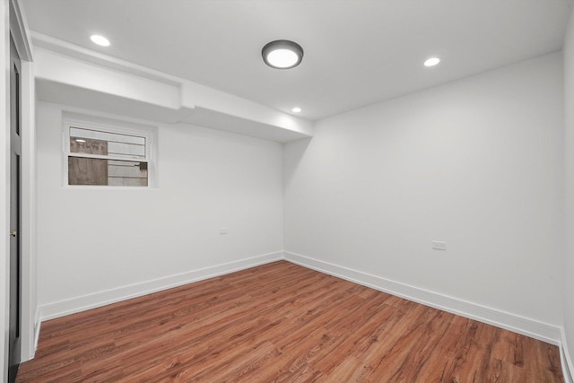 unfurnished room featuring wood-type flooring