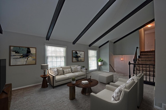 carpeted living room featuring beamed ceiling and high vaulted ceiling