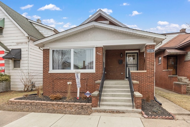 bungalow-style home with covered porch