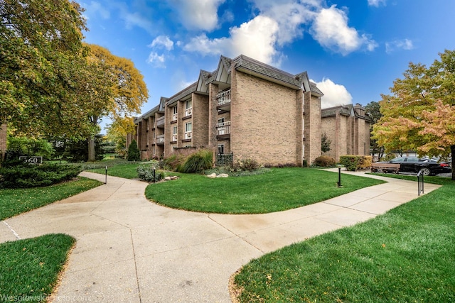 surrounding community featuring a lawn