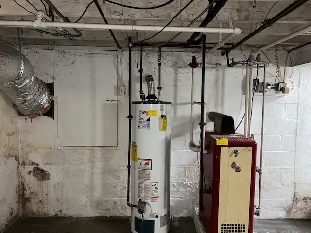 utility room featuring gas water heater