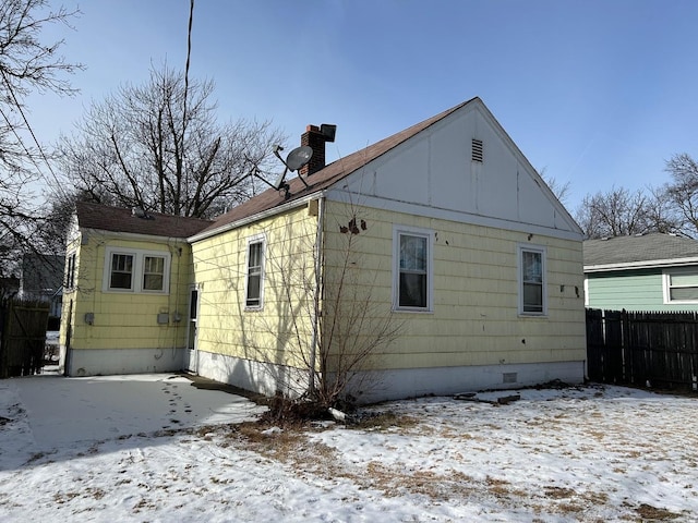 view of snow covered property