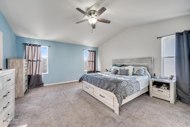 bedroom featuring ceiling fan, lofted ceiling, and carpet floors