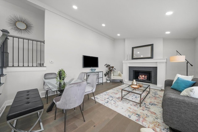 living room with dark hardwood / wood-style floors