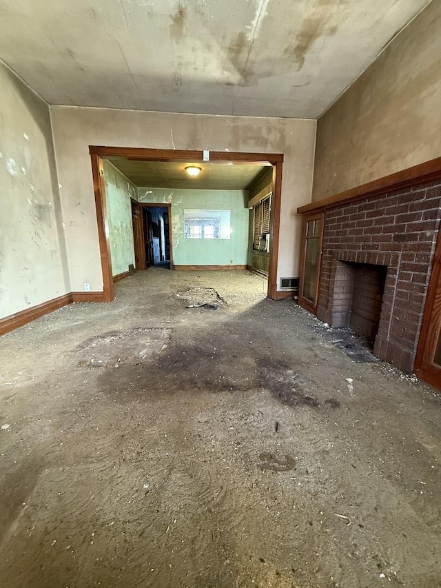 miscellaneous room featuring a brick fireplace