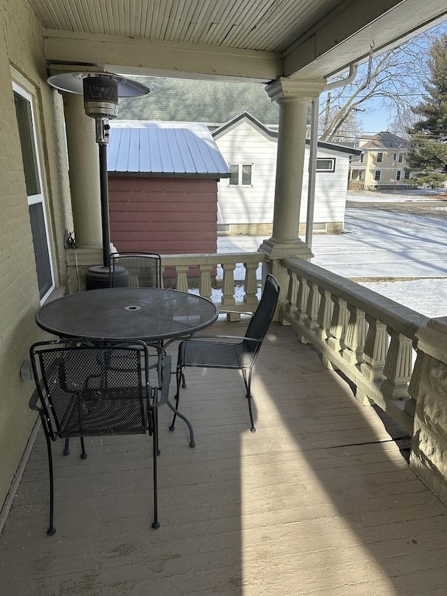 deck featuring outdoor dining area