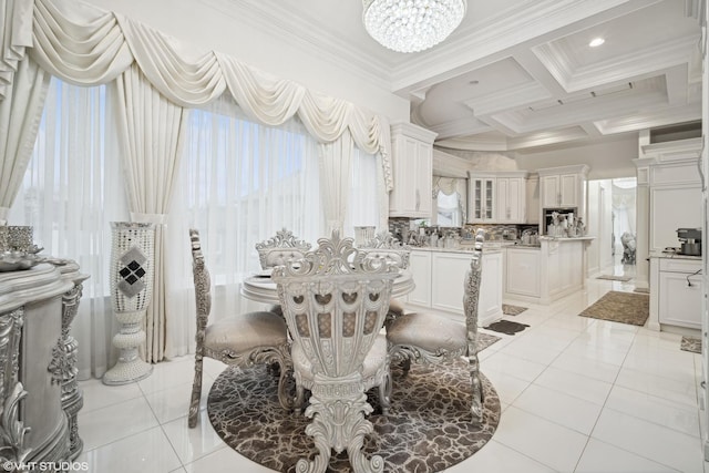 tiled dining area with coffered ceiling, beamed ceiling, ornamental molding, and a chandelier