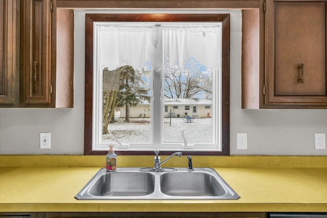 kitchen with sink and a wealth of natural light