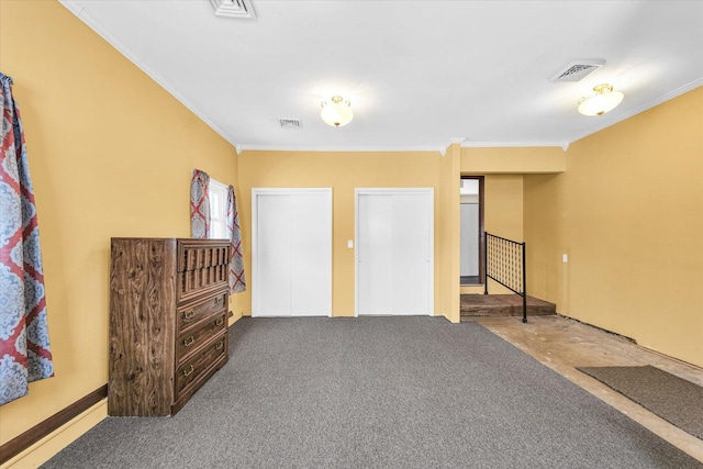 interior space with crown molding and carpet floors