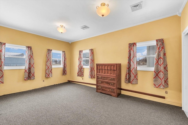 carpeted spare room featuring ornamental molding