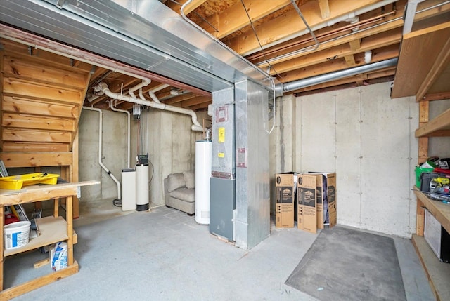 basement featuring heating unit and gas water heater