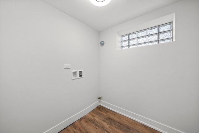 washroom featuring hookup for a gas dryer, hookup for a washing machine, and dark wood-type flooring