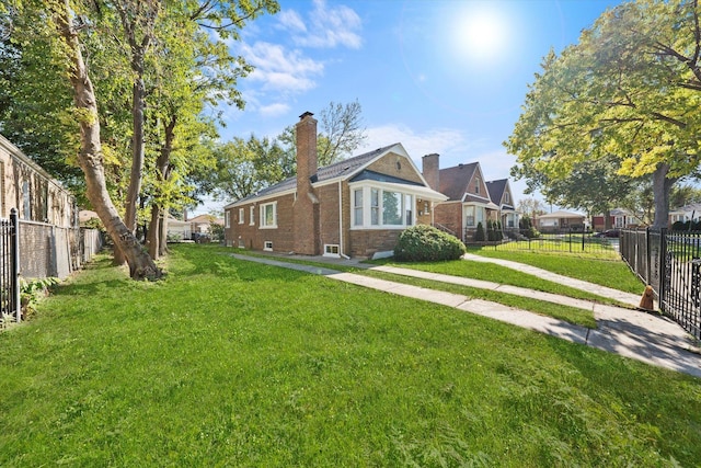 exterior space featuring a front lawn