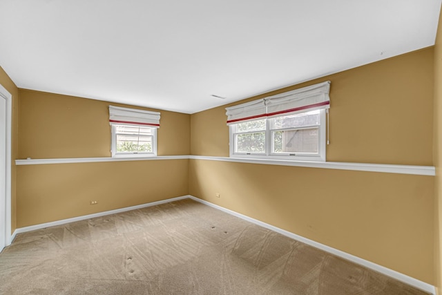 view of carpeted spare room