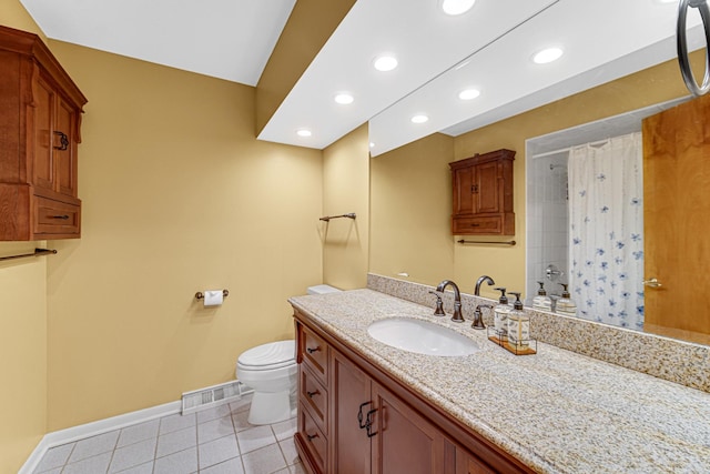 full bathroom featuring tile patterned flooring, vanity, shower / tub combo, and toilet