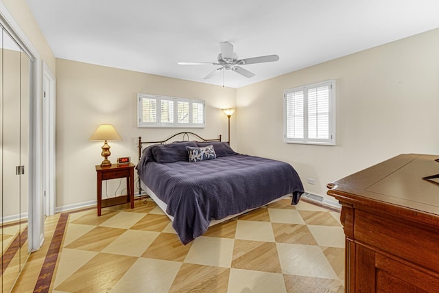 bedroom featuring ceiling fan and a closet