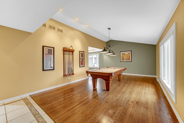 playroom with lofted ceiling, pool table, and light wood-type flooring