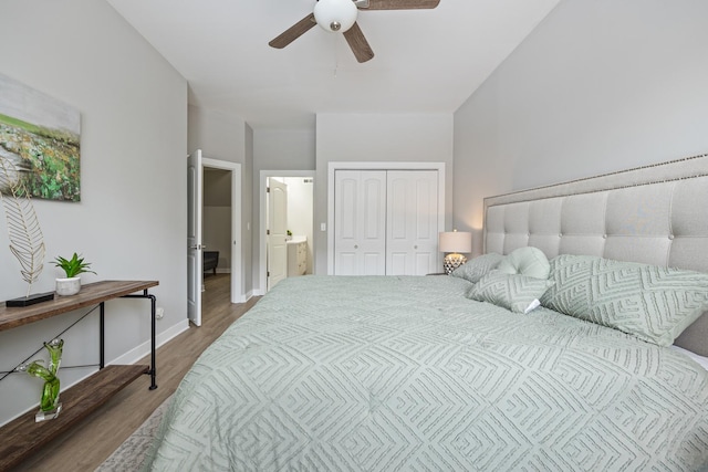 bedroom with wood-type flooring, a closet, ceiling fan, and ensuite bathroom