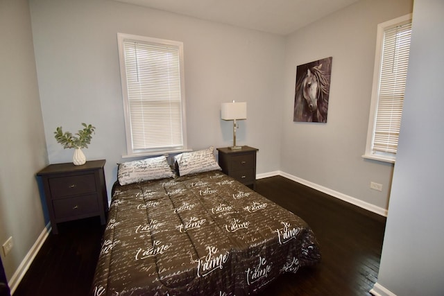 bedroom featuring dark wood-type flooring