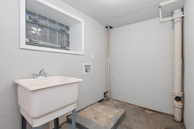 bathroom featuring concrete flooring and sink